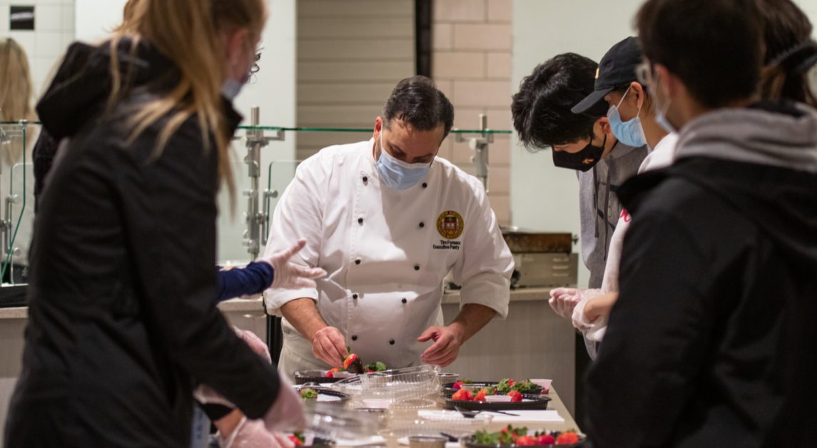 Students Craft Chocolate-Covered Strawberries at Valentines-Themed Event
