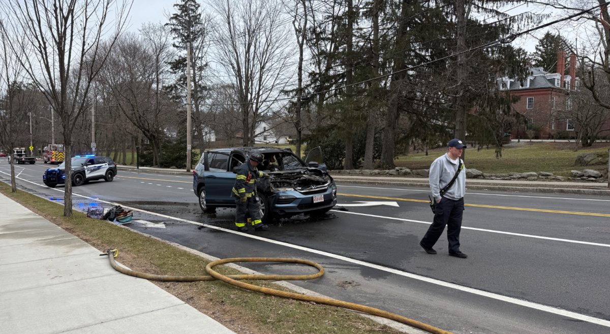 First responders received a call about the vehicle fire at 3:09 p.m., according to the Newton Police Department. (Laney McAden / Heights Editor)
