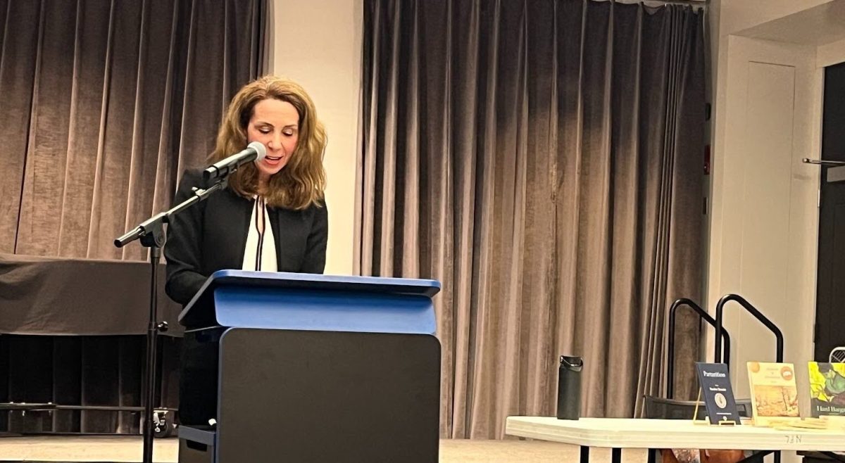 Heather Treseler speaking at the Newton Free Library on Wednesday. (Jisu Yee / Heights Staff)
